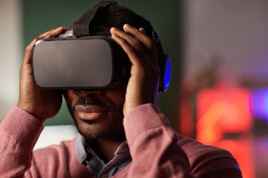 VAcorp member using VR goggles during training